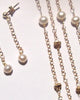 Long pearl chain and earrings